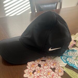 Nike Black Hat with White Swoosh Logo